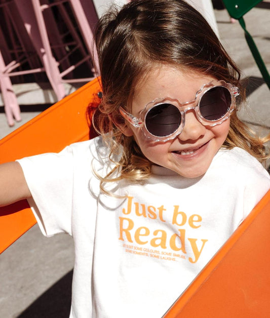 Lunettes de soleil enfant blanc transparent forme fleur verres foncés Hello Hossy