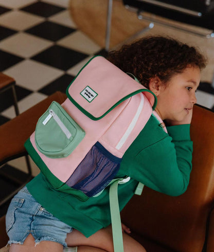 Children's pink backpack with green details and mesh pocket Hello Hossy