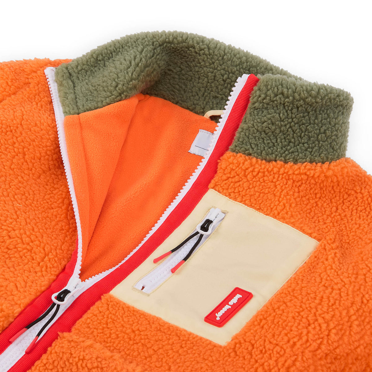 Children's Orange and Beige fleece jacket with green collar and zipped pockets Hello Hossy